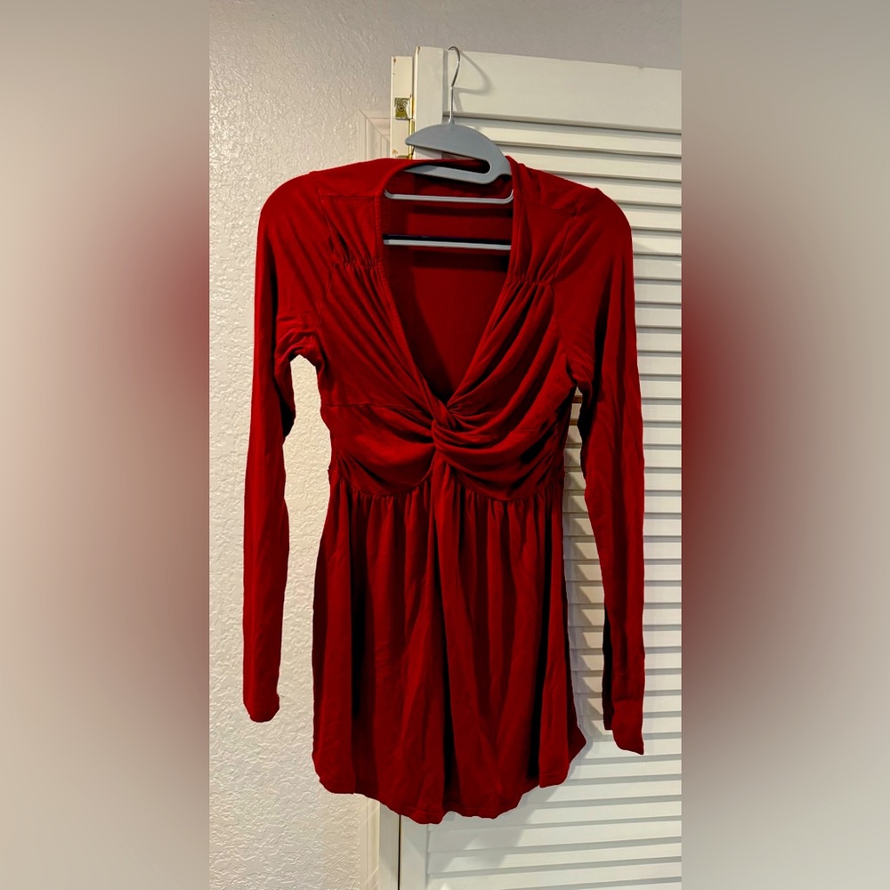 Red maternity shirt.